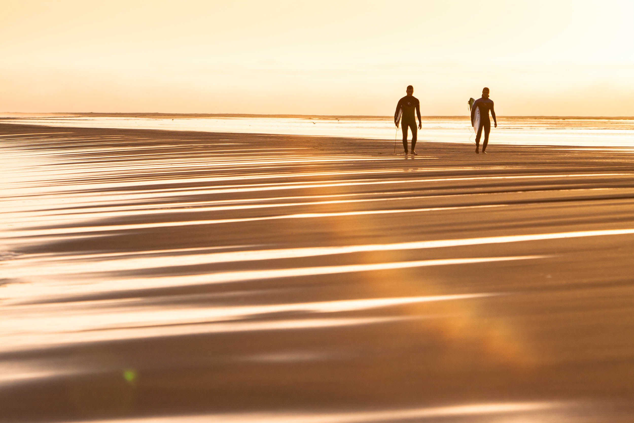 Surfers in Namibia [Photo: Alan Van Gysen]